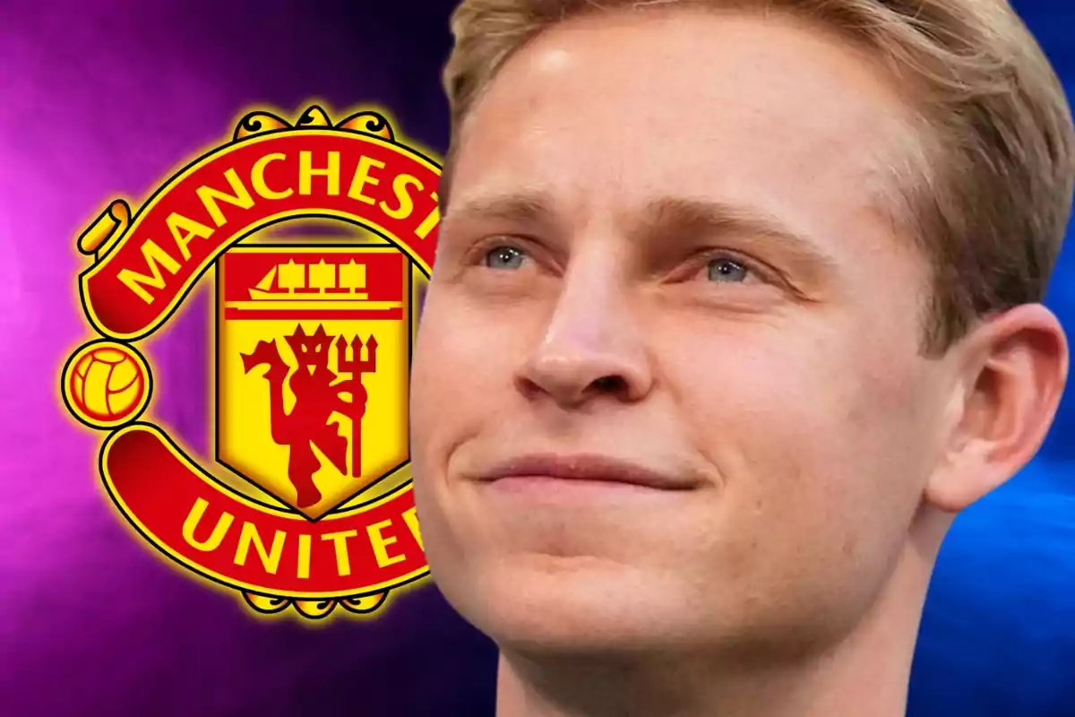 A smiling blonde man with the Manchester United logo in the background.